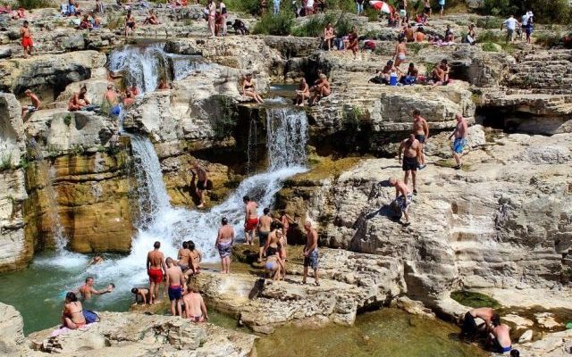 Bathers at Les cascades de Sautadet, France - Destination Europe - Lineupping