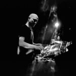 Paul Kalkbrenner live on stage with black background - Monegros Desert Festival 2022 - Lineupping.com