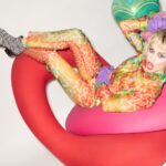 Miley Cyrus funny portrait in a colourful dress by official Facebook - Corona Capital 2022 - Lineupping.com