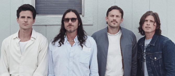 Kings Of Leon band members standing up - credits Ticketmaster - Kings Of Leon Tour Dates - Lineupping.com