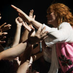Portrait of Florence Welch of Florence + The Machine with fans - credits Laura Coulson - Mad Cool Festival 2026 - Lineupping.com
